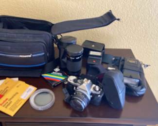 Pentax Camera With Lenses And Flashes