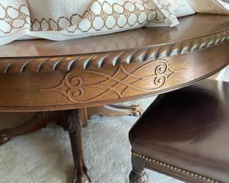 Antique centennial style mahogany carved pedestal table. 4 leaves