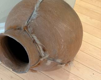 Vintage pottery with leather/fur trim