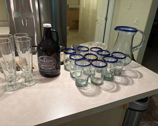 hand-blown glassware and pitcher, growler, and beer glasses