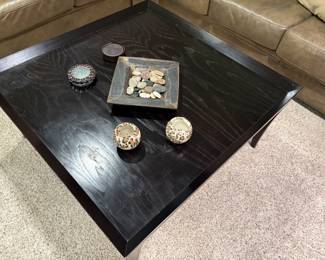 Square black wood coffee/cocktail table, coasters and decor