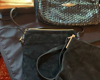 Evening bags and cross-body black suede purses