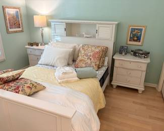 Full-size bed with storage hutch headboard, Full-size Sealy Posturepedic mattress (like new), 2 nightstand, brushed stainless lamp, and decor