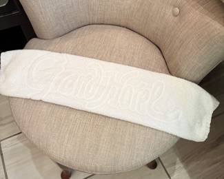 Vanity chair and Grand Hotel bath mat