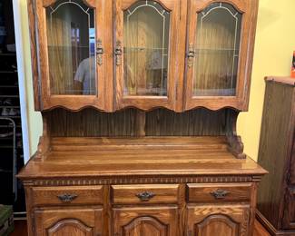 China dresser with working inside light.