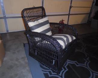 one of two swivel /glider Harlie & Stone wicker chairs