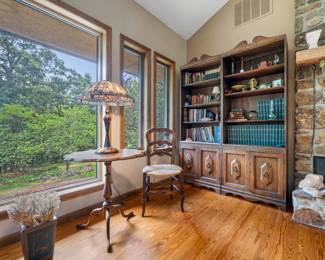 Ladderback Chair, MCM Bookcases, Books, Accent Table & Lamp.  Photo by GingerSnapper Photography