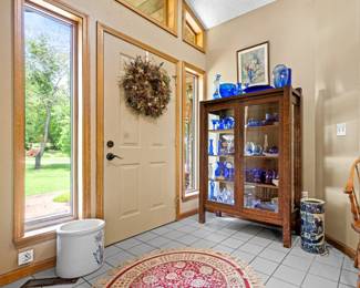 Display Cabinet, with Cobalt Blue Decor Pieces & 6 Gallon Crock.  Photo by: Ginger Snapper Photography