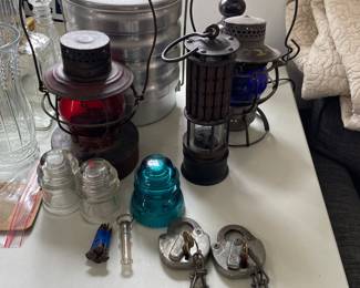 Railroad lanterns, nails, and locks items. Coal Mine lantern, and Miners lunch box. 