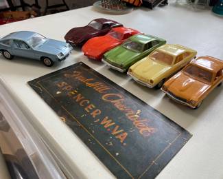 Chevy Dealer promo cars and Dealer sign.