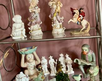 Porcelain girls with cat and dog, monkey figures, Asian figures