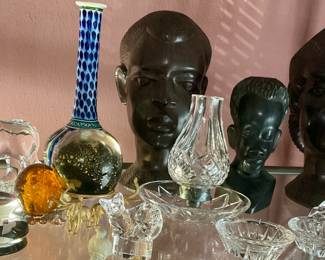 African ebony wood head carvings, Waterford Crystal lamp, baccarat paper weights, Val St Lambert lead Crystal 
