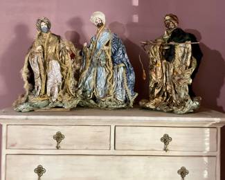 The three wise men figures,  highboy cabinet