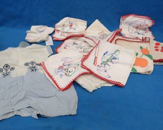 Lot 290. Hand embroidered dishtowels and more in an old hat box.