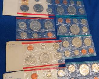 Lot 402. Uncirculated U.S. coin sets from 1972, 1973 (2), 1974, and 1975