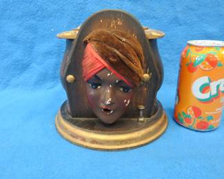 Lot 295. 1920s era Kindel and Graham Gypsy head mechanical cigarette dispenser in working condition