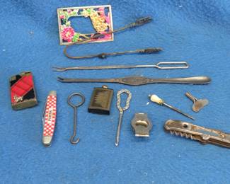 Lot 45. Buttonhooks. Purnia pocket knife. Cunard Steamship Co olive fork. And more.