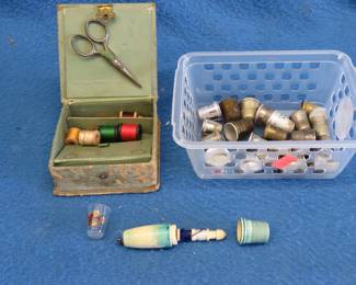 Lot 44. Thimbles and a vintage sewing kit