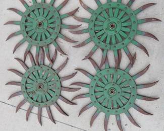 Lot 61. Four matching John Deere implement rotary hoe wheels