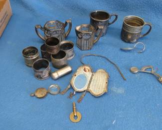 Lot 33. Sterling jelly spoon. 1930 Art Deco locket with mirror. And more.