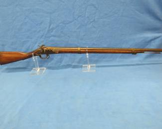 Lot 18. Antique black powder rifle. Unknown maker or caliber. Not safe to shoot. Non-operable hammer and trigger. Definite wall hanger.