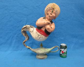 Lot 102. Two wishes left with this plaster Genie and bottle. 20" tall with original paint.