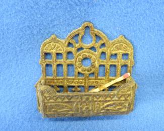 Lot 274. Vintage cast match stick holder