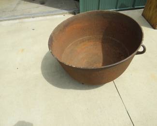 Lot 161. Vintage cast iron kettle 26" wide x 17" deep, has all three feet, marked 30 on the bottom