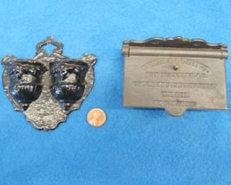 Lot 319. Two match holders. A Bradley and Hubbard and one with a patent date of 1864.