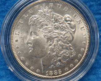 Lot 226. 1885 P Morgan silver dollar: All coins from this set are being sold individually in this auction.