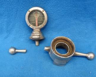 Lot 73. Boyce Moto Meter radiator cap with thermometer and two pieces of beveled glass. For parts or repair.