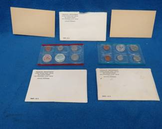 Lot 143. Three 1969 US Mint Uncirculated sets. Each set contains coins from both the Philadelphia and Denver Mints. Two have never been opened.