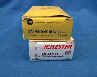 Lot 238. 100 25 Auto rounds: 50 Winchester. 50 UMC.