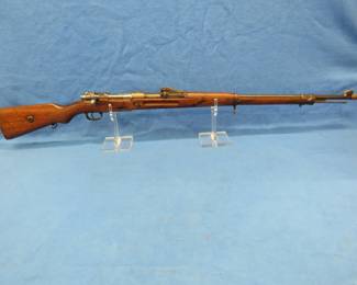 Lot 207. 1918 Mauser Gew 98 8mm bolt-action rifle. Oberndorf armory. SN 9883. Matching serial numbers. Includes rare muzzle cover. Very good condition.