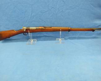 Lot 305. Antique Mauser Chileno Model 1895. SN L7827. DMW Arsenal. 7 x 57 cal. All matching serial numbers including the cleaning rod. Very good condition.