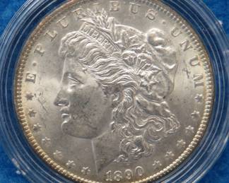 Lot 227. 1890 P Morgan silver dollar: All coins from this set are being sold individually in this auction.