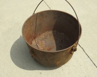 Lot 158. Vintage cast iron kettle. 11 1/2" wide x 8 1/2" deep, still has all three feet