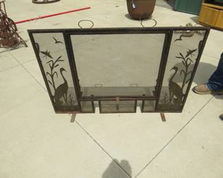 Lot 163. 46" x 31" brass and steel framed fireplace screen