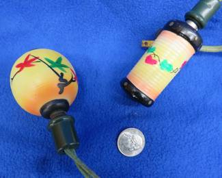 Lot 378. Two old strands of electrified Christmas tree lights with glass ornaments for the bulbs including birds, vegetables, decorations, Santas and more.