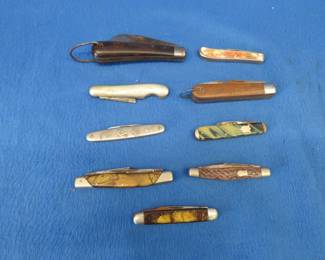 Lot 279. Nice collectible pocket knives including a Colonial with advertising, Lunawerk Germany Masonic-theme, wooden handle made in Japan, J. Russel Hawksbill, and more.