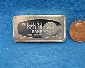 Lot 287. Franklin Mint Bank-marked sterling silver ingot. 65.25 grams.