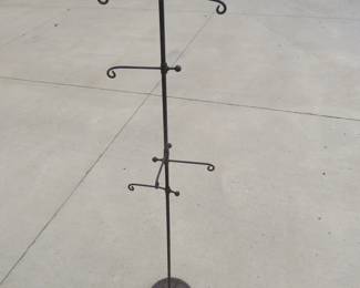 Lot 166. Old unmarked cast iron 49" stand for hanging something