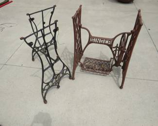 Lot 164. Two treadle sewing machine cast iron frames, one Singer and one White