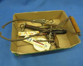 Lot 179. Vintage small collectibles including a fruit pitter, corkscrews, and more