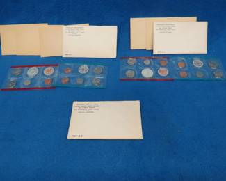 Lot 142. Three 1968 US Mint Uncirculated sets. Each set contains coins from both the Philadelphia and Denver Mints. One has never been opened.