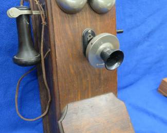 Lot 377. Antique Western Electric old crank telephone patented July 17, 1894 and marked 250W. It has the mechanics as shown in the photo and rings nicely when cranked.