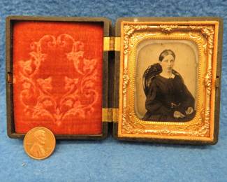 Lot 375. Hand-colored tintype in its original case