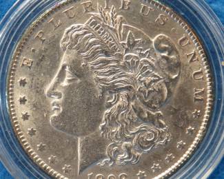 Lot 408. 1898 P Morgan silver dollar from a boxed set. All coins from this set are being sold individually in this auction.