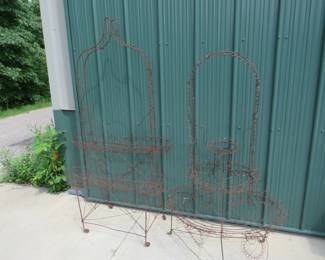 Lot 151. Pair of rolling wire flower stands