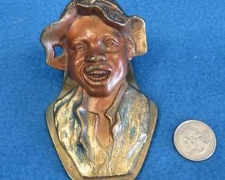 Lot 191. Black Americana antique cast iron paper clip or letter holder